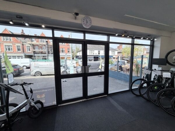 View from inside the Cycle Centre looking out onto the busy high street. 