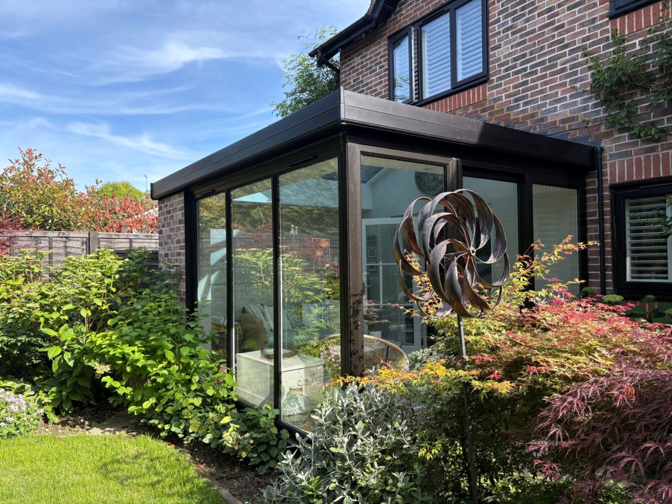 View of the hup! extension from the outside in showing the patio doors to the right.